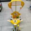 Detský bicyklík (žltý, so strieškou, pomocnými kolieskami)